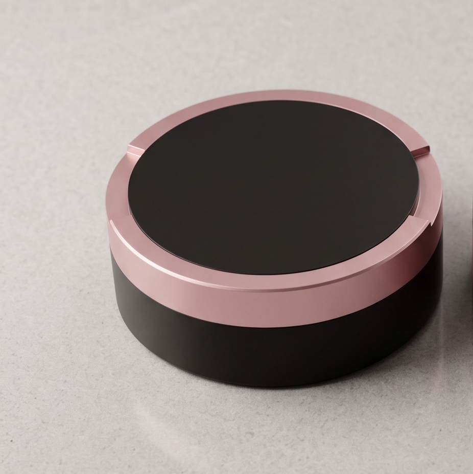 Tvåfärgad snusdosa i aluminium med svart lock och botten samt rosa ring i mitten från Duo Edition.